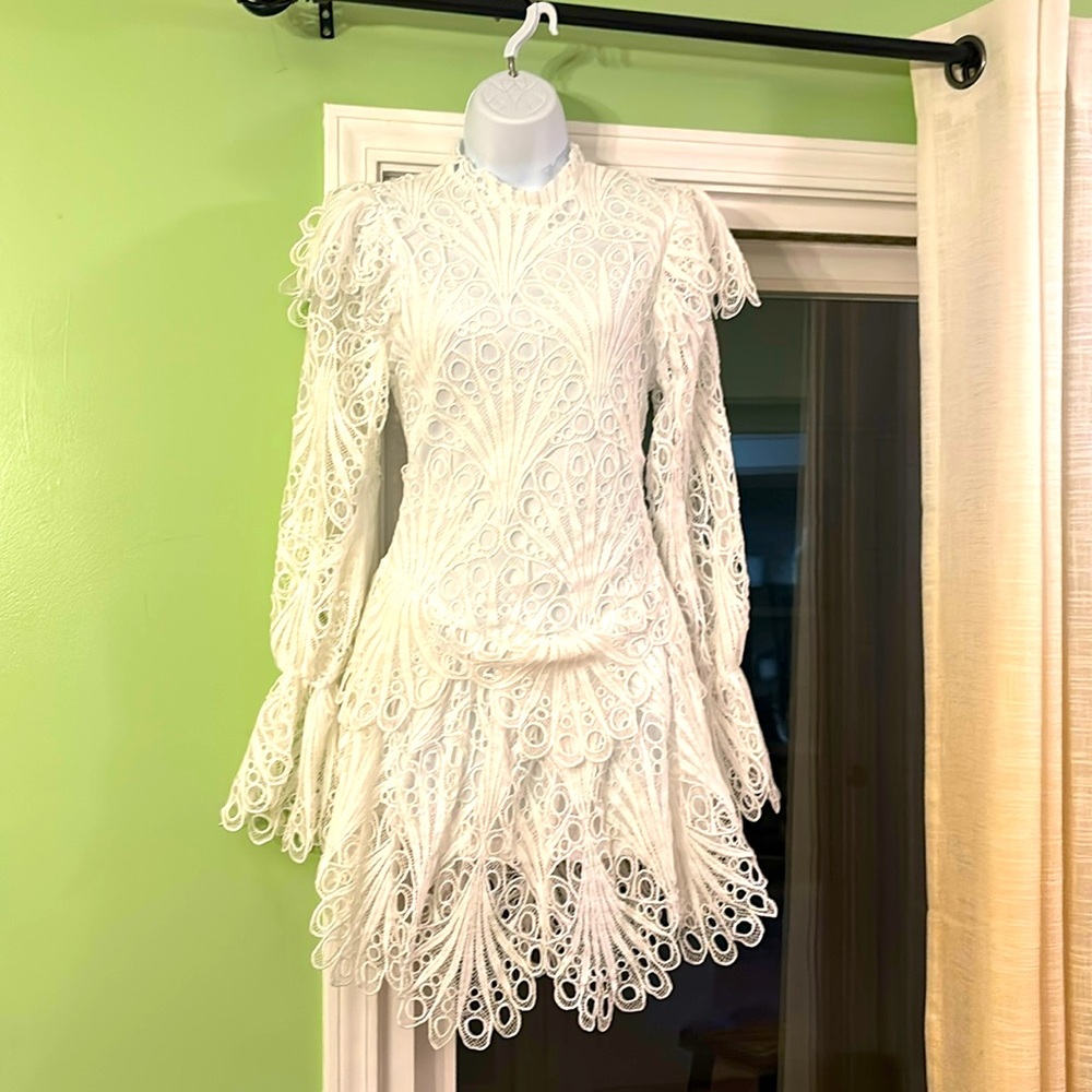 Brand New Lace Mini Dress. It has never been worn.